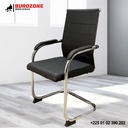 Chaise visiteur en simili cuir